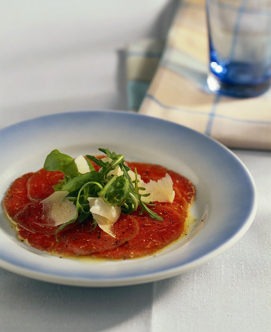 Beef carpaccio with rocket and Parmesan