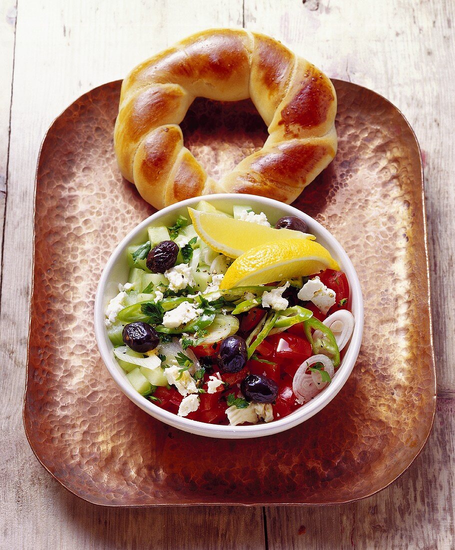 Coban salatasi (millet salad; Turkey) with bread ring 
