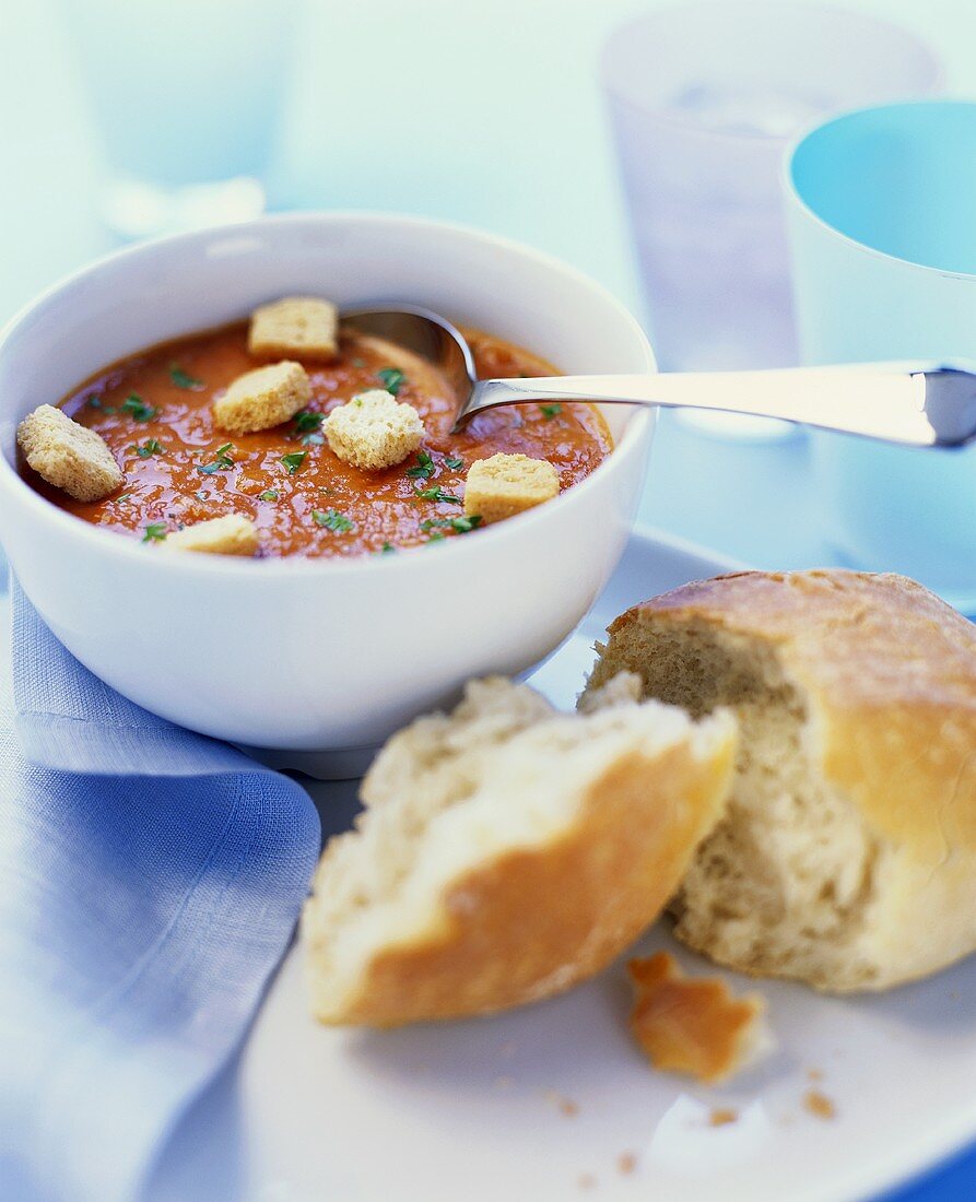 Cold cream of tomato soup with bread cubes
