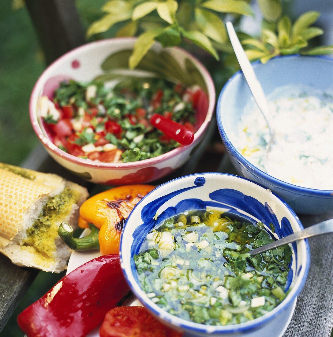 Coriander marinade, yoghurt dip, pepper salad & garlic bread