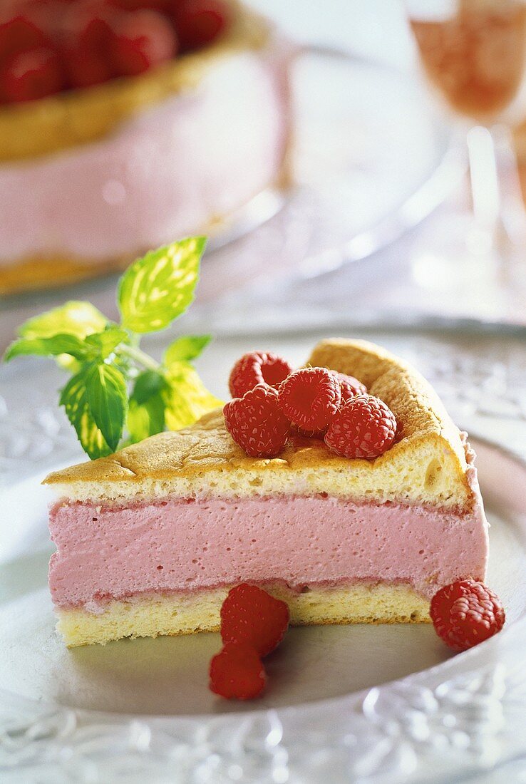 A piece of raspberry cream cake