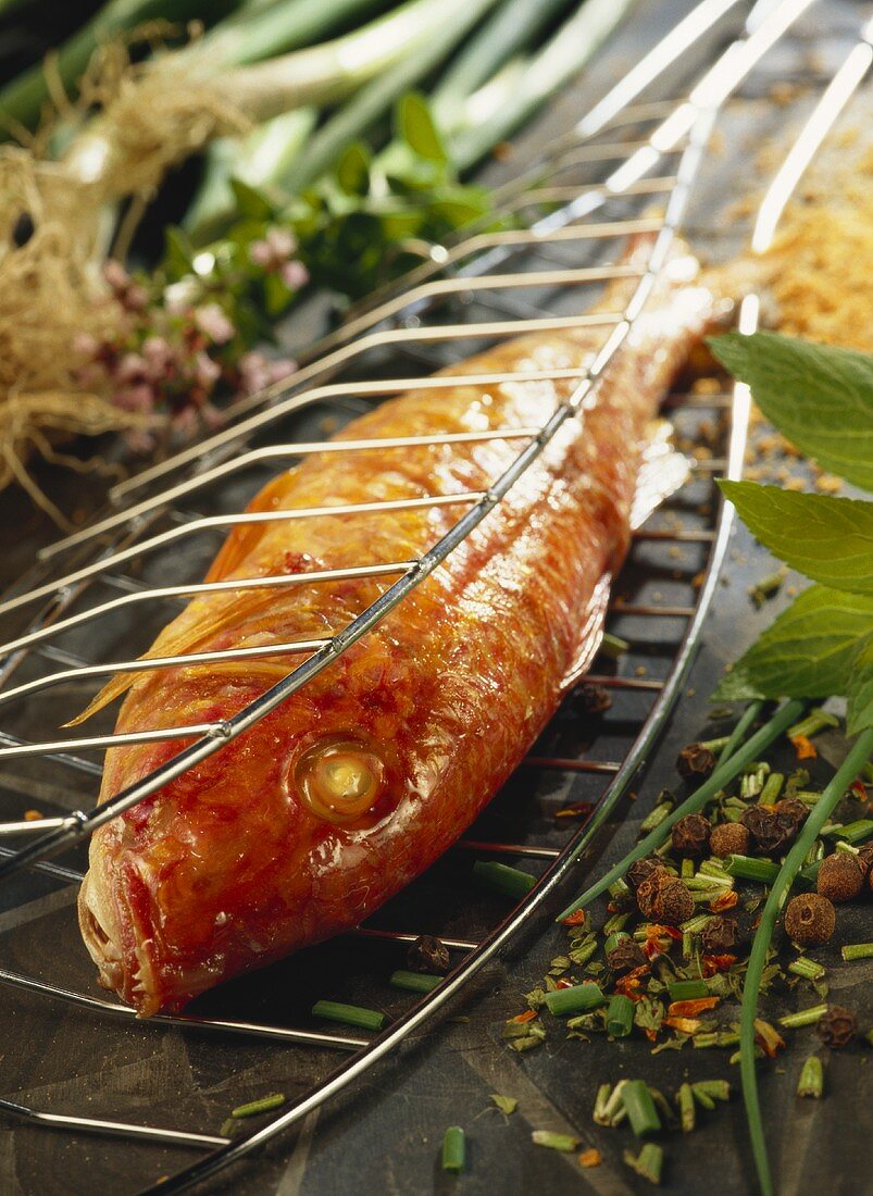 Red mullet in barbecue basket