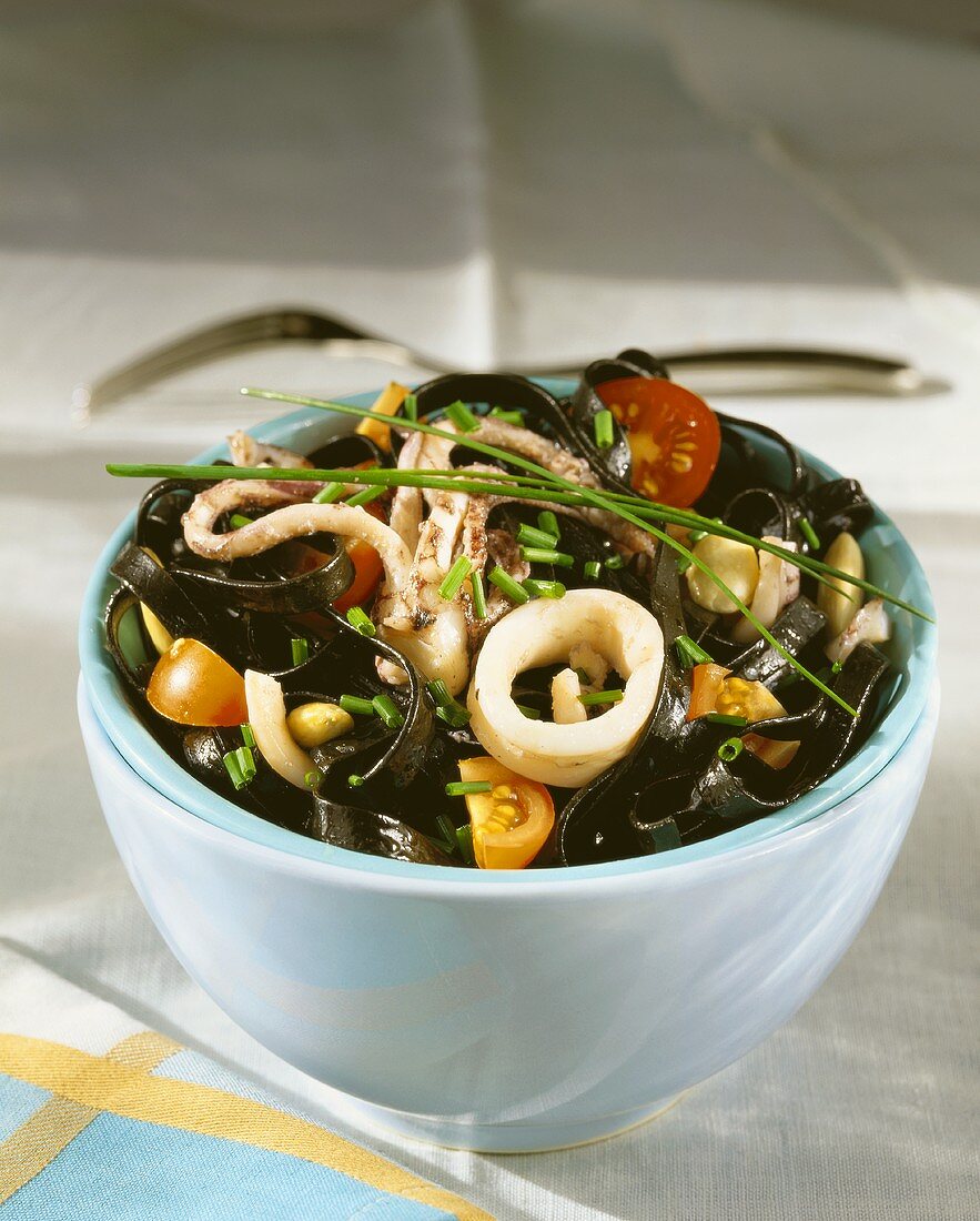 Cuttlefish salad with black pasta