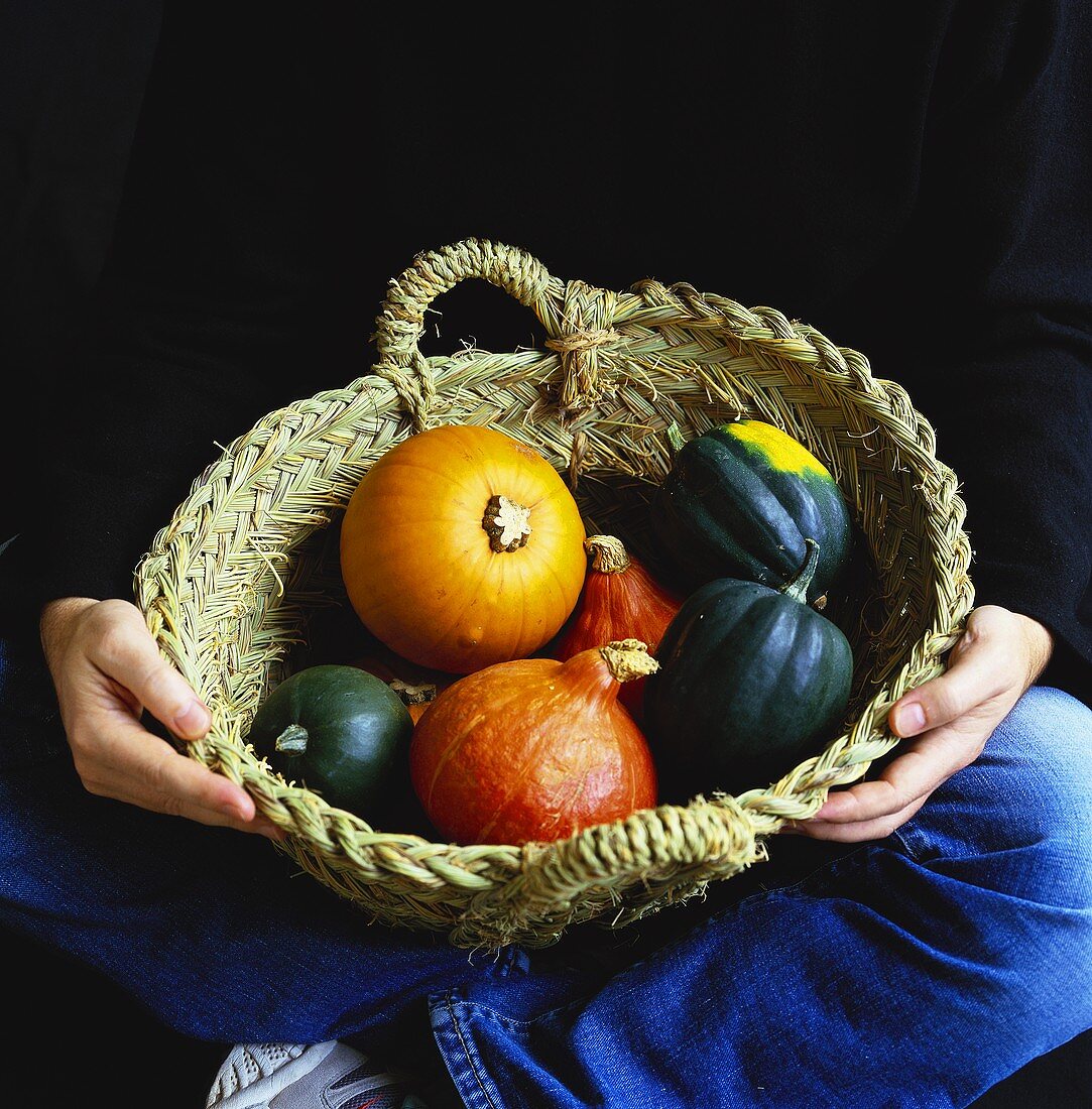 Assorted pumpkins in basket