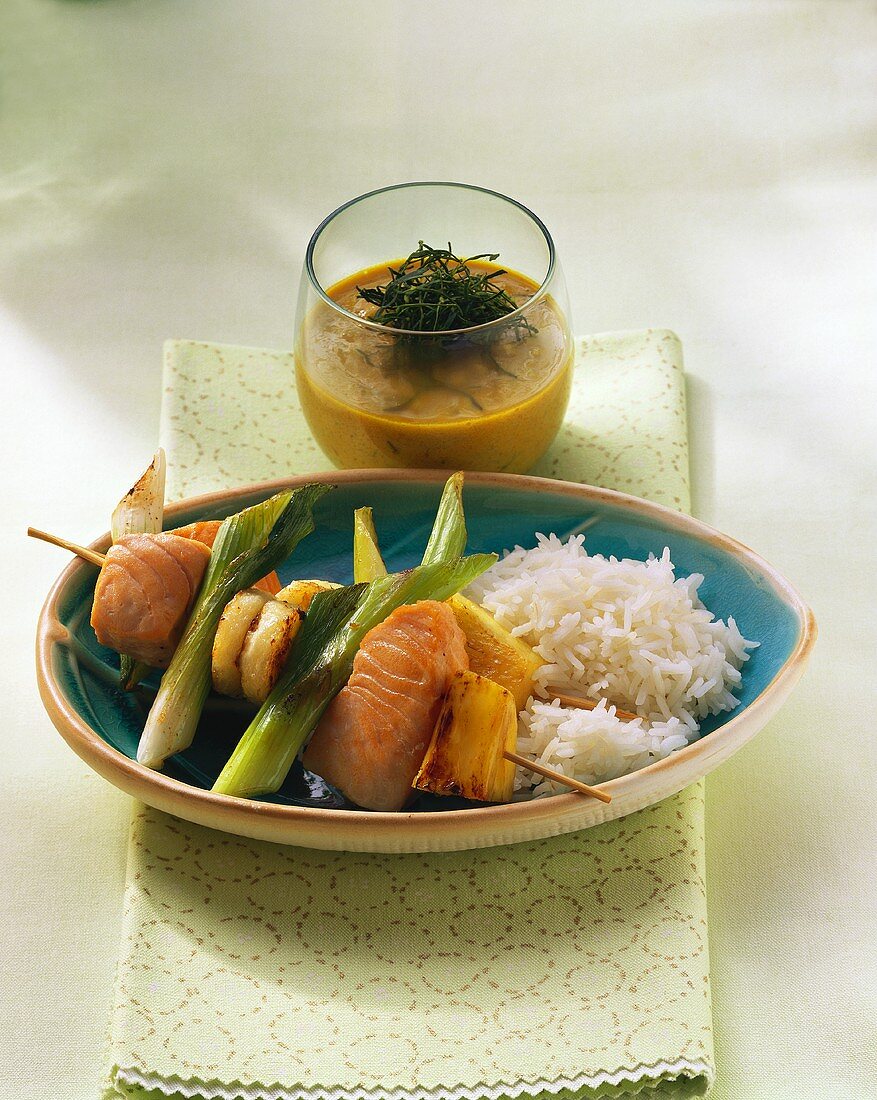 Salmon kebabs with rice and curried coconut whip