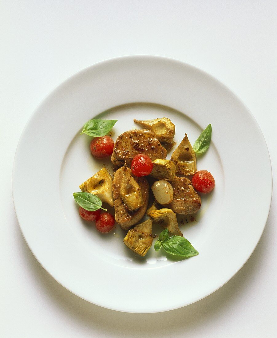 Pork medallions with artichokes and tomatoes