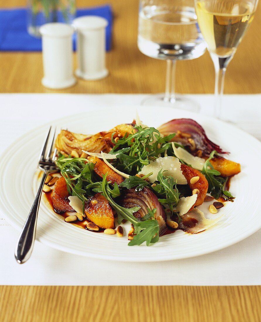 Vegetable salad with pumpkin, rocket and Parmesan