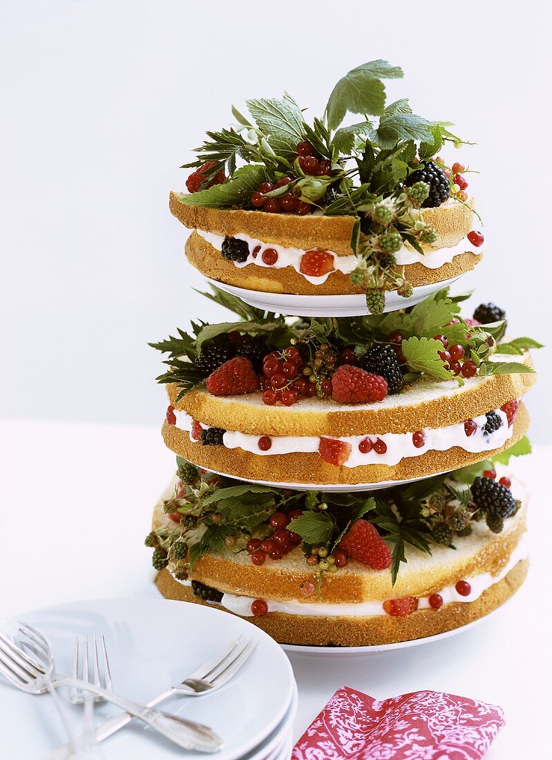 Three-tiered cake with berries