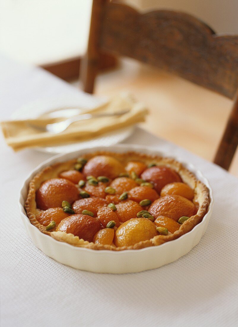 Peach and apricot tart with pistachios