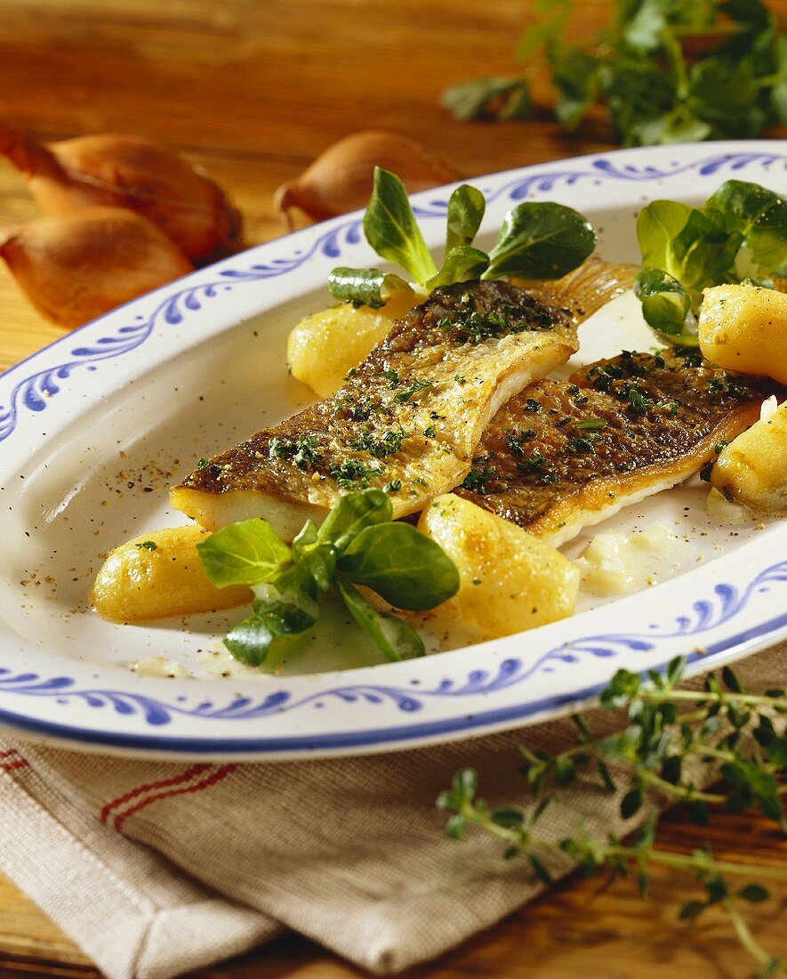 Fried grayling with boiled potatoes