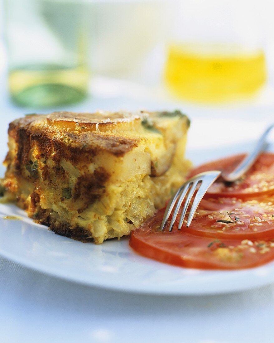 A piece of potato and onion tortilla