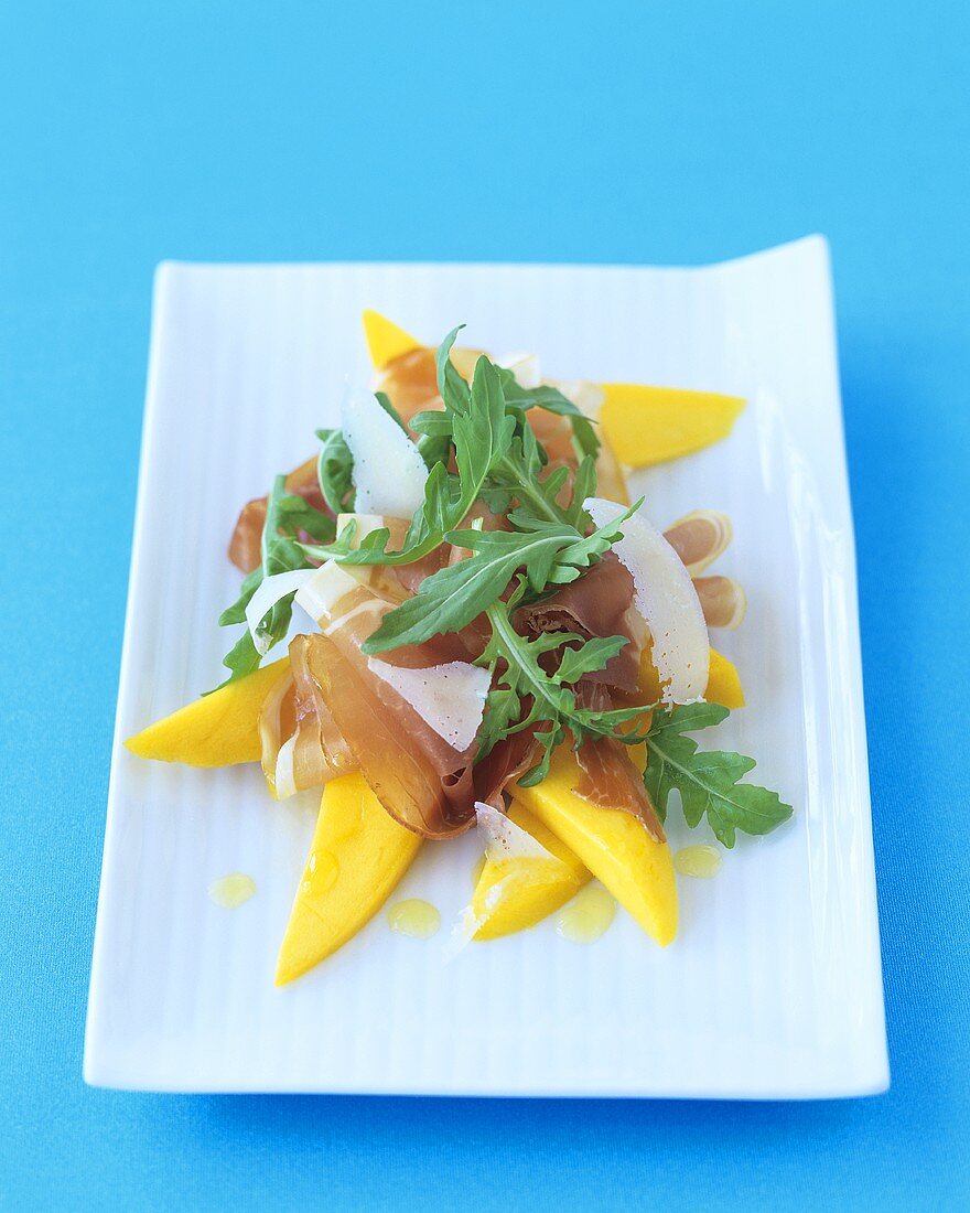 Mango mit Parmaschinken und Rucola