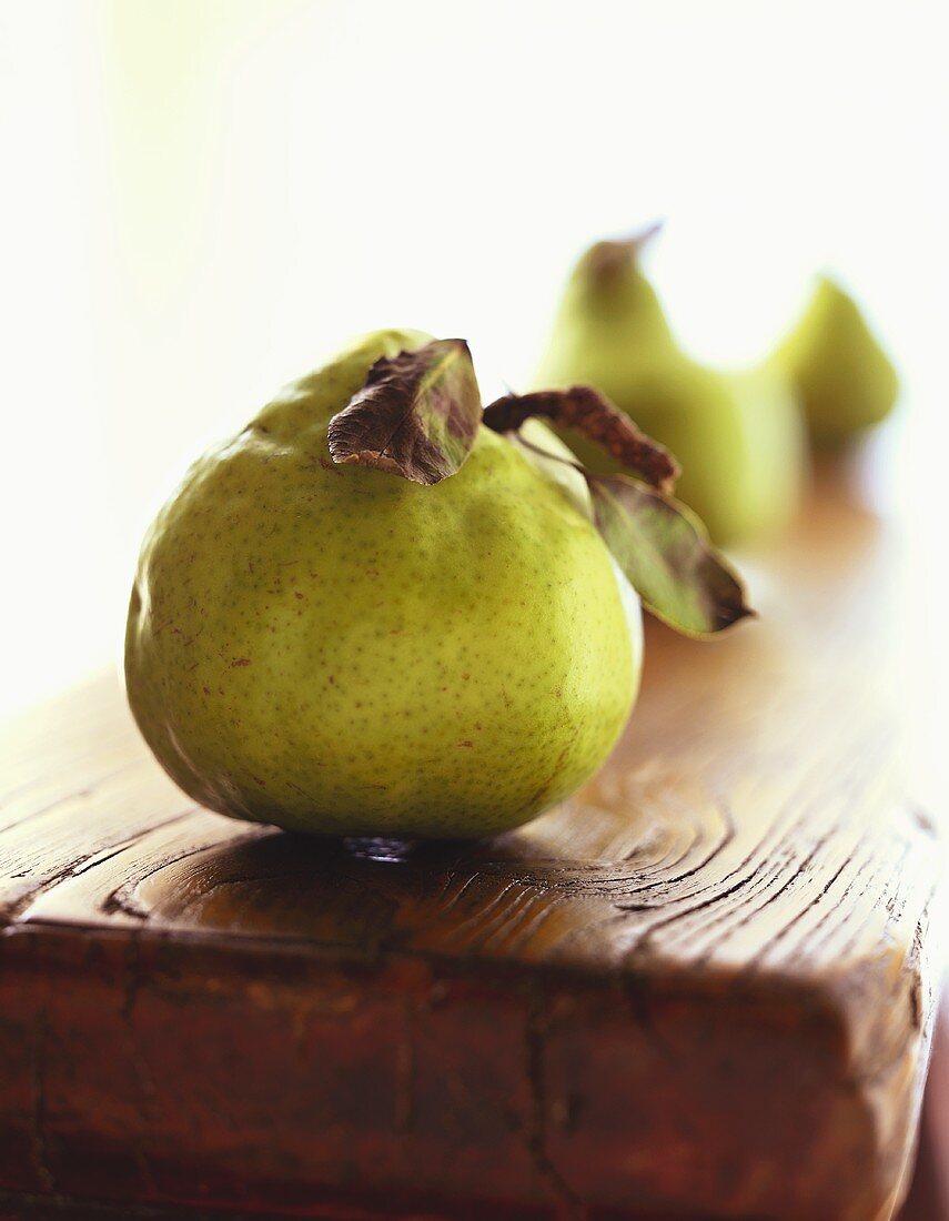 Green pear with leaves