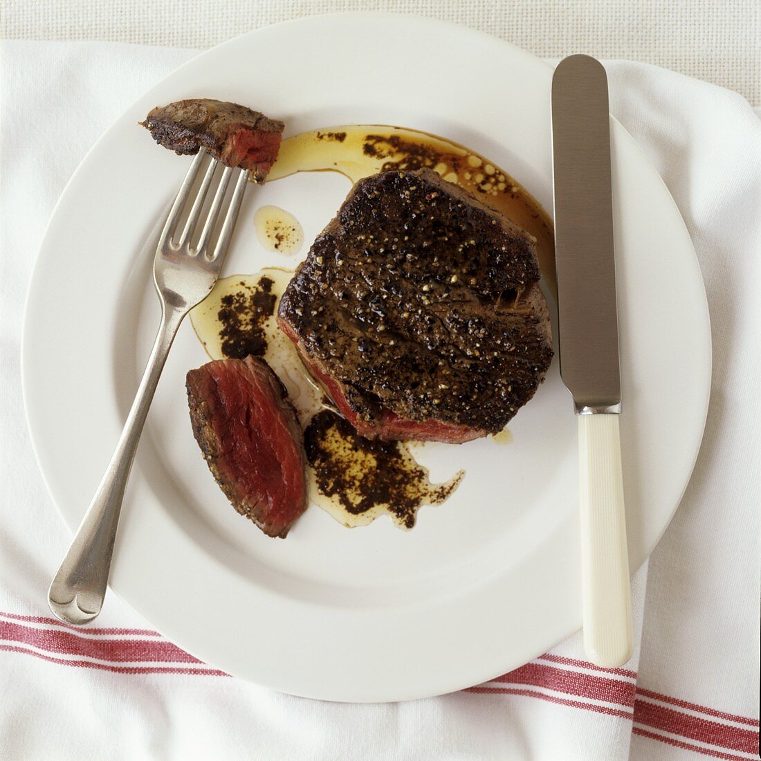 Beef steak (rare) with pepper crust