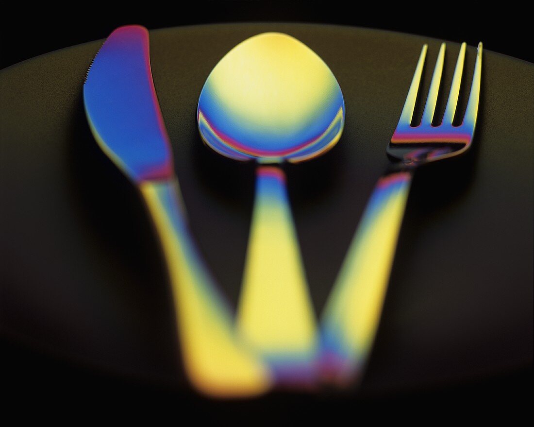 Knife, fork and spoon