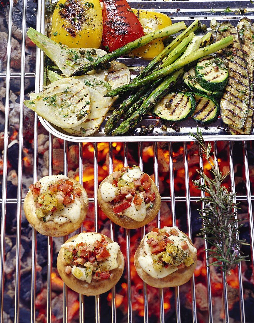 Vegetables and stuffed mushrooms on the barbecue