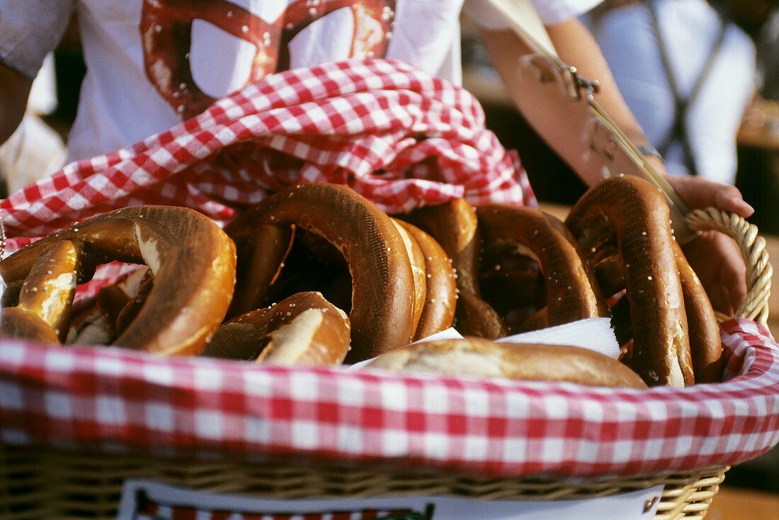 Giant pretzels in bread basket at a fair