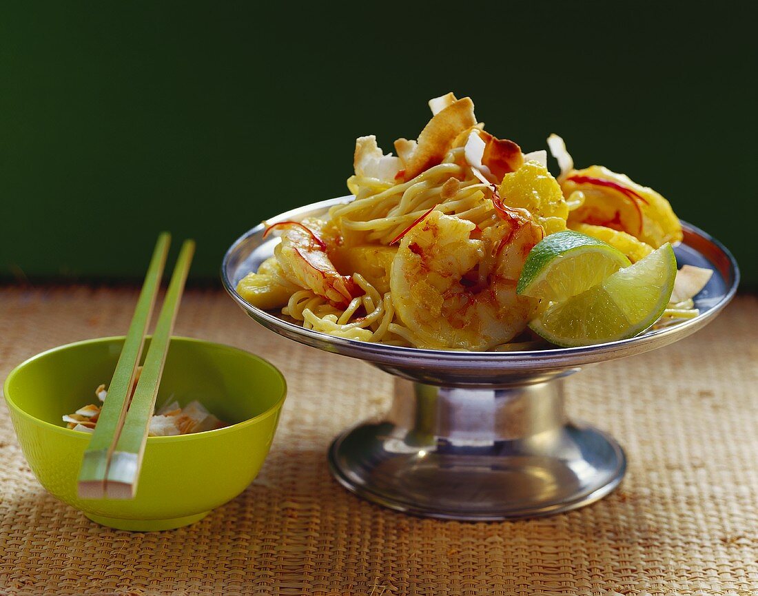 Noodles with coconut, turmeric, shrimps and pineapple