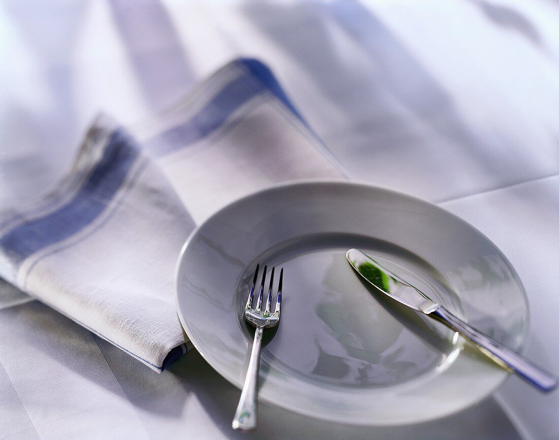 White plate with cutlery