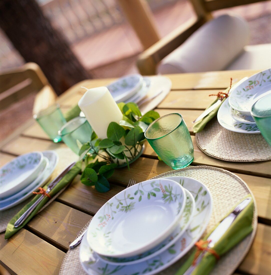 Table laid in rustic style in green and white