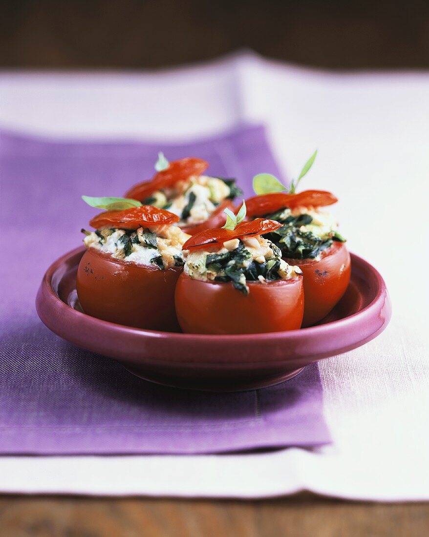Gratinierte Tomaten mit Spinat-Ricotta-Füllung