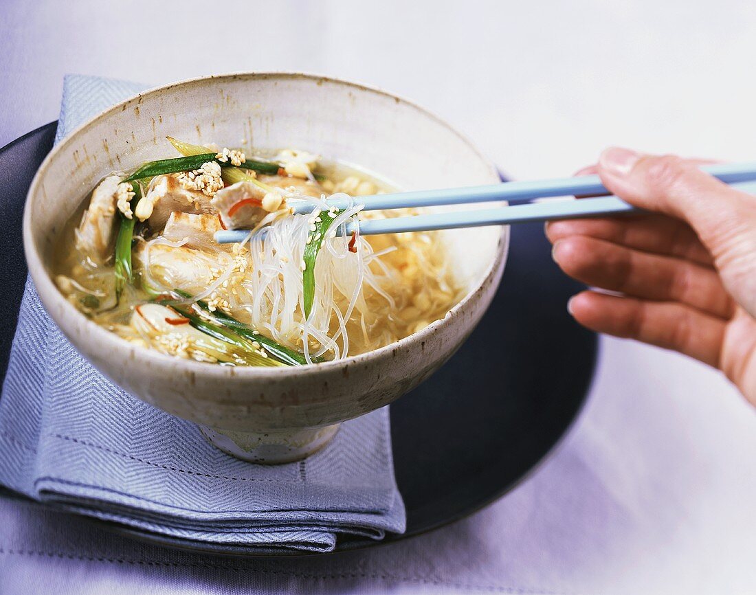Asian soup with glass noodles and chicken
