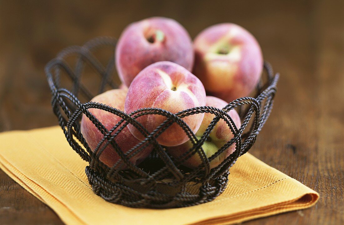 Peaches in small basket