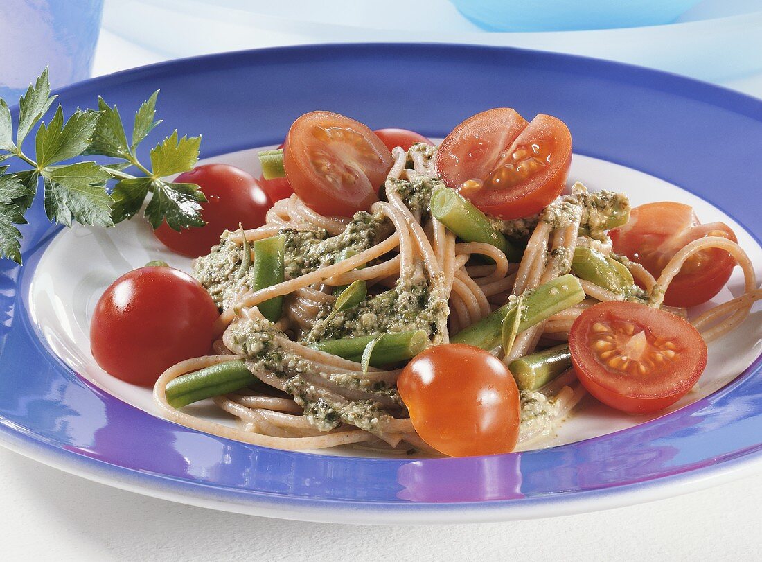 Spaghetti with nut pesto and cherry tomatoes
