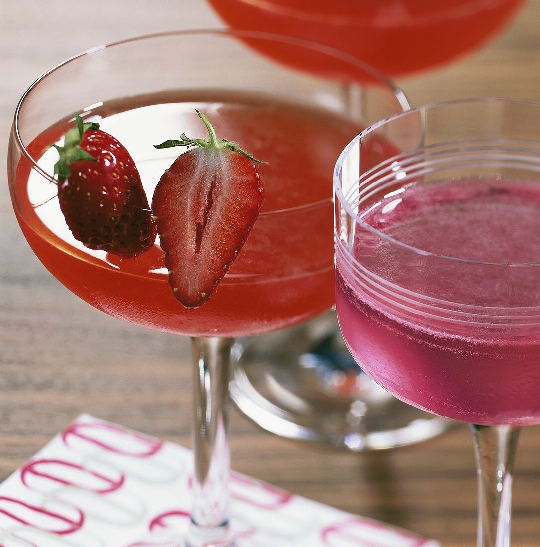Two cocktails: 'Strawberry Cosmopolitan' & 'Cosmopolitan'
