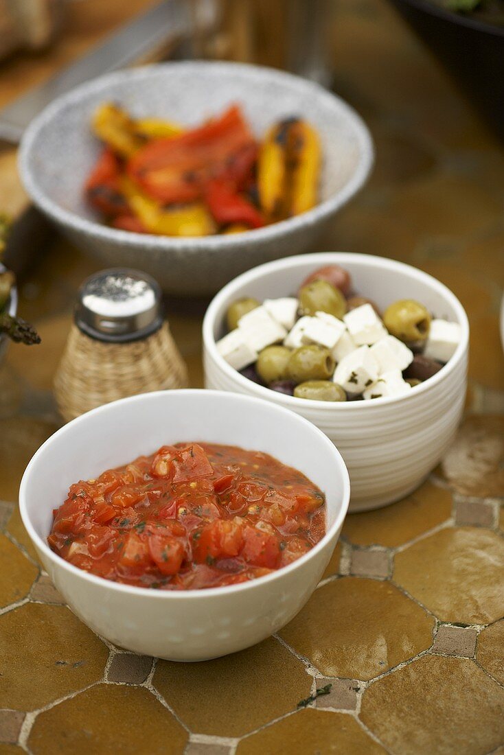 Tomato salsa, olives with feta and barbecued peppers