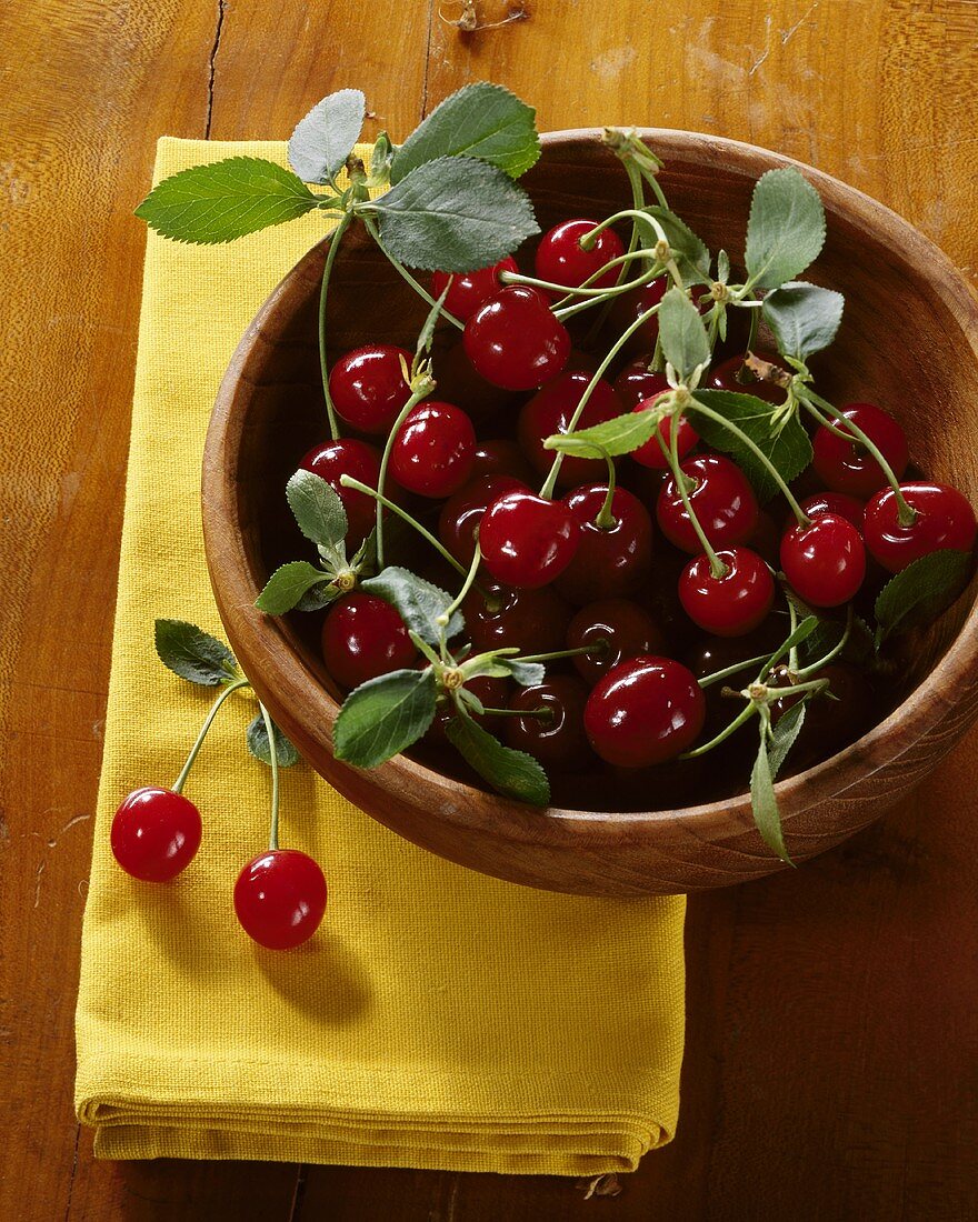 Sour cherries in a wooden bowl