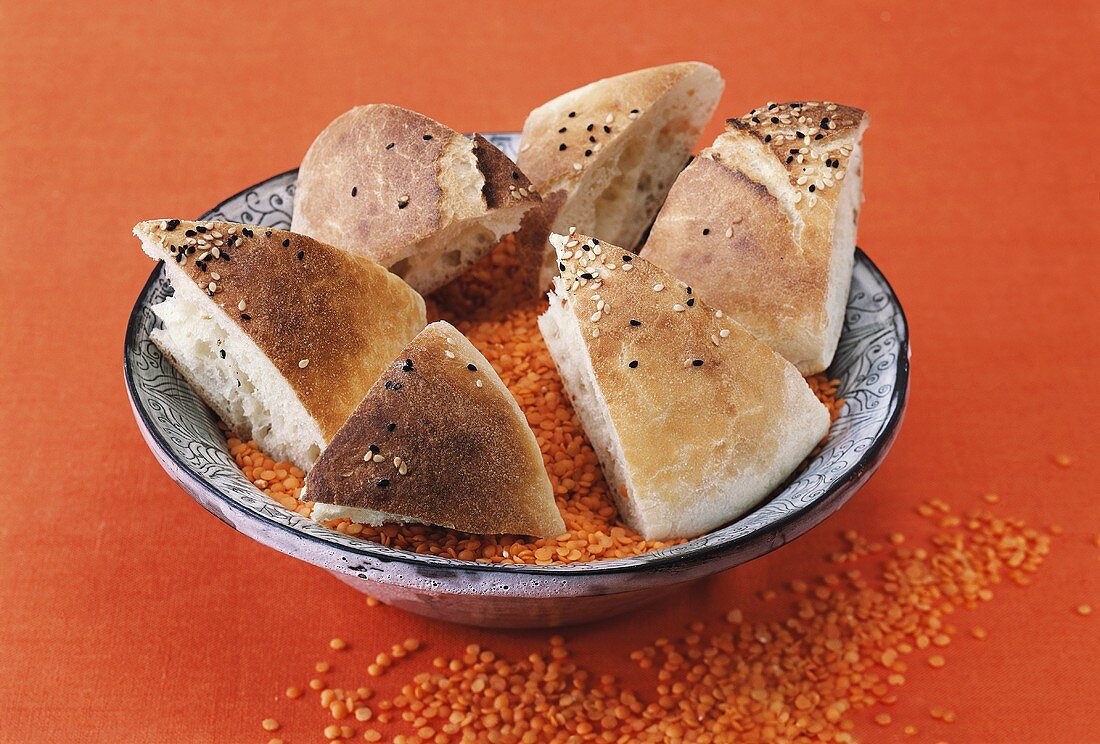 Flatbread in a dish with red lentils