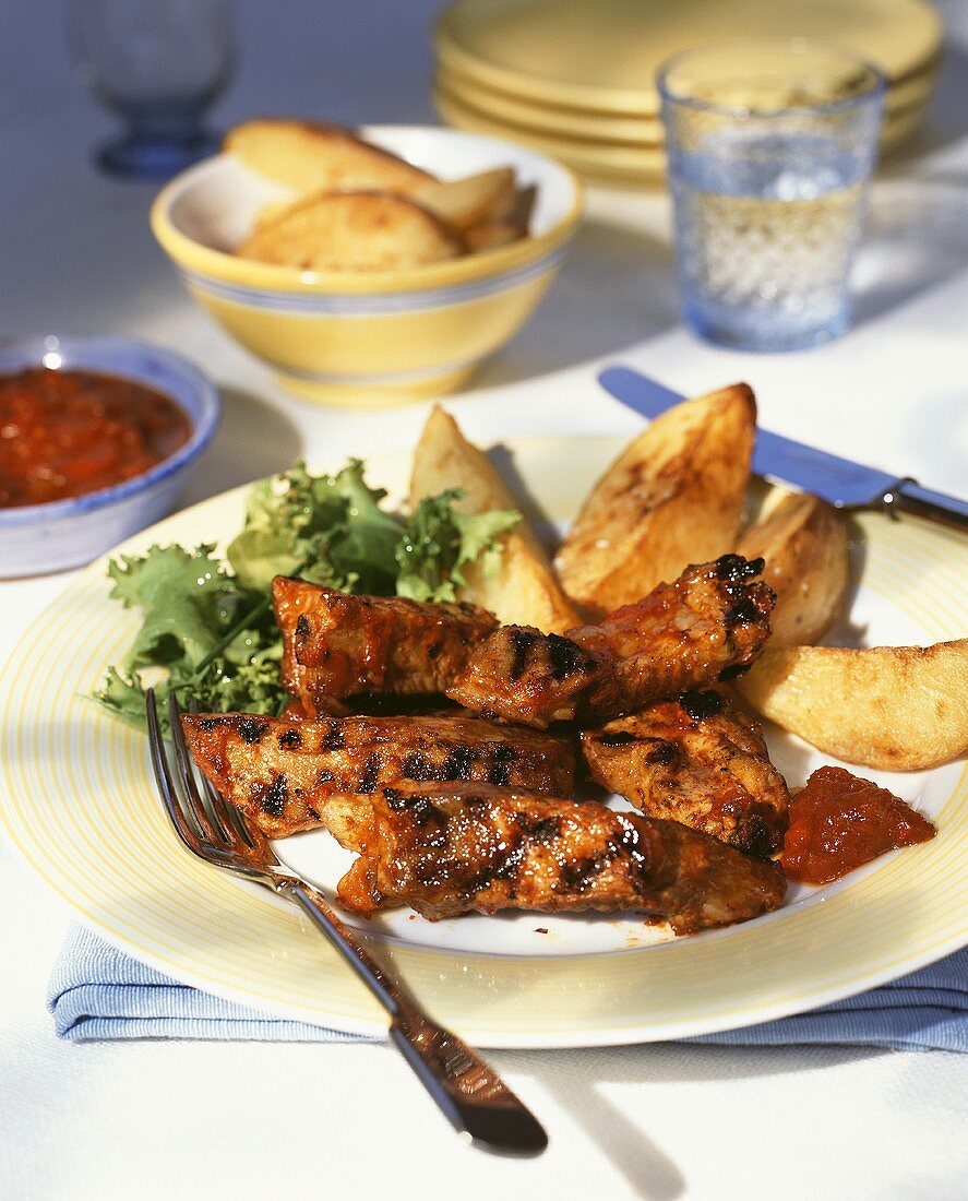 Grilled spare-ribs with potato wedges