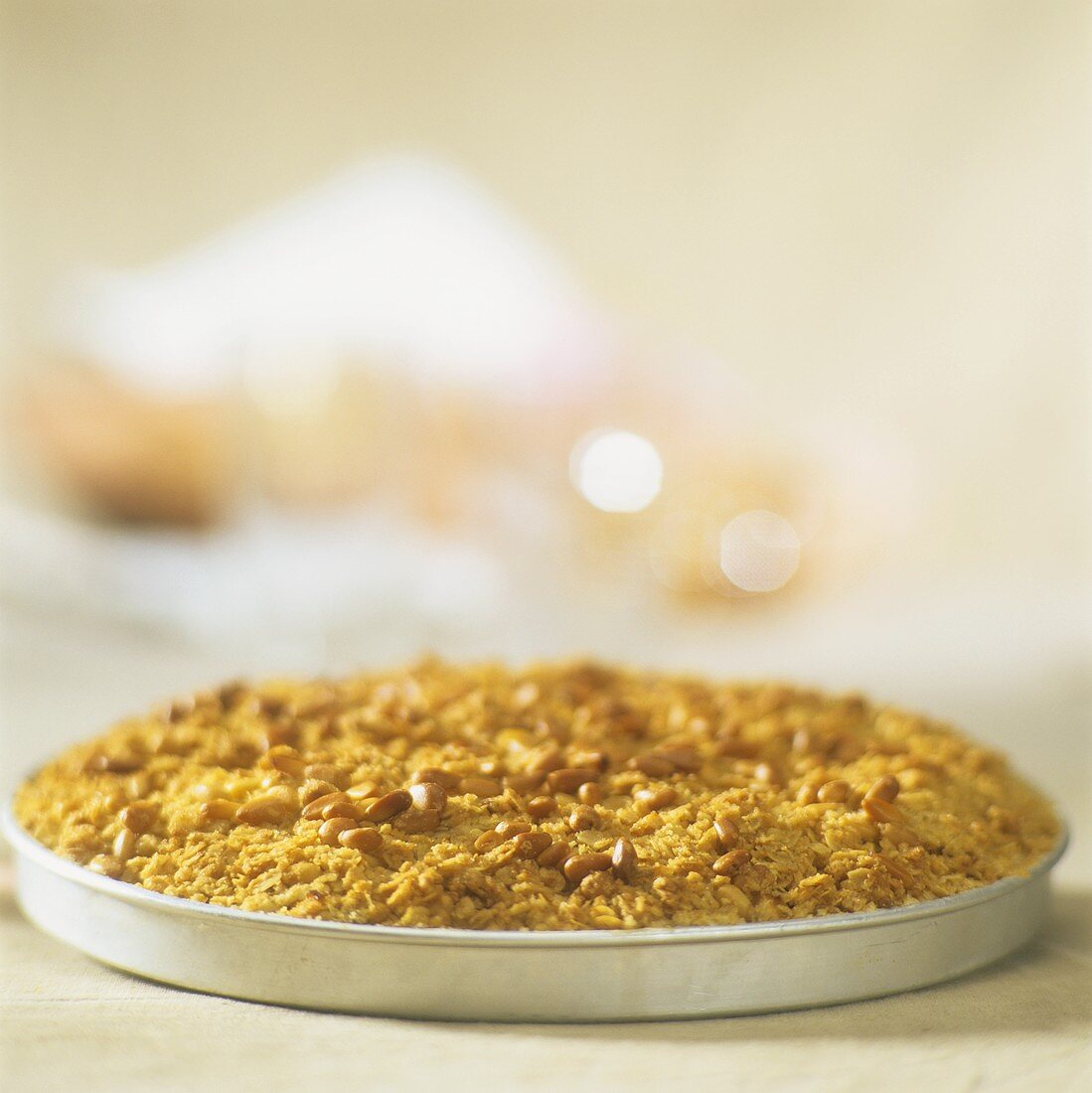 Wholemeal apple tart with pine nuts