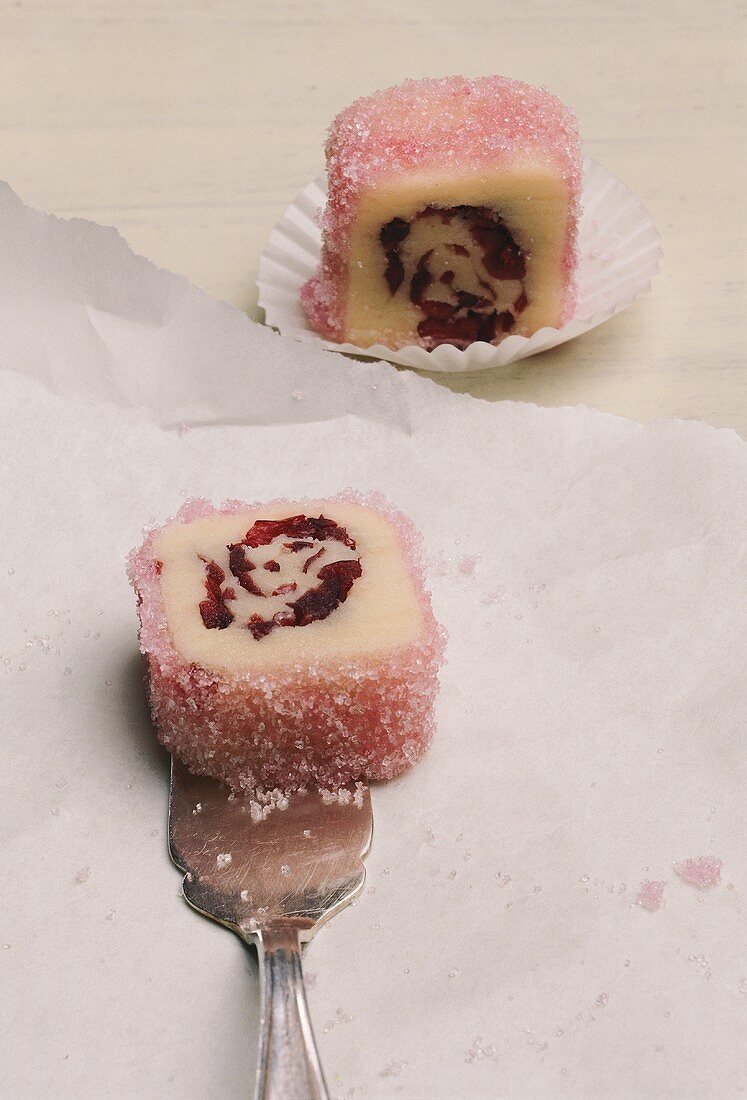 Marzipan sweets with cranberry centres