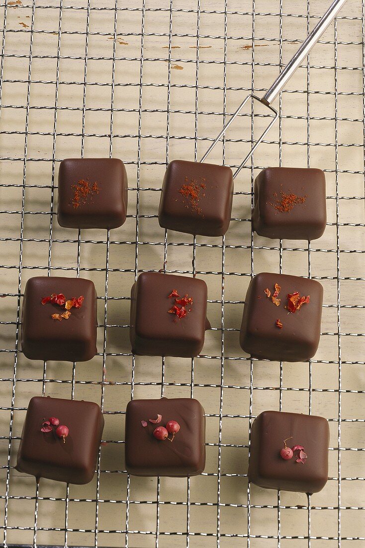 Chocolates with pink peppercorns and with chili