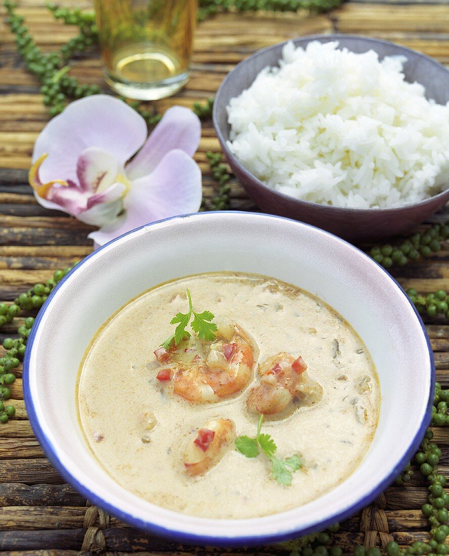 Thai curry with king prawns and coriander leaves