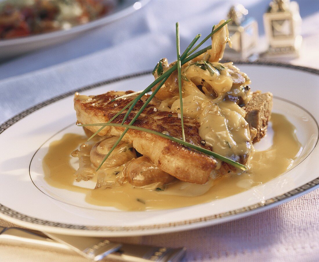 Veal cutlet with mushrooms and Sauce Madère