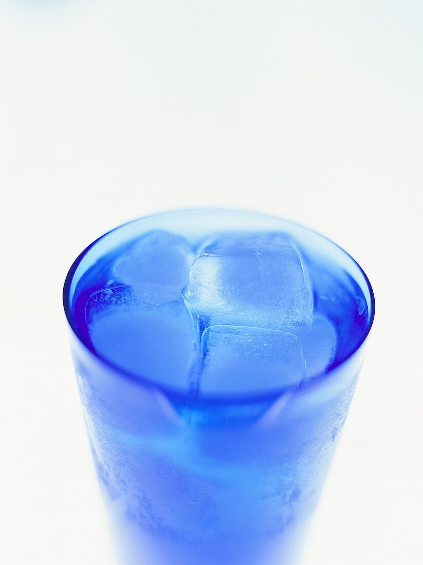 A glass of water with ice cubes