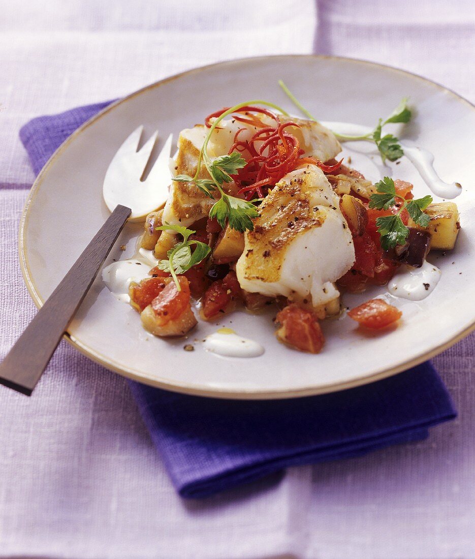 Fish with aubergines & tomatoes and yoghurt