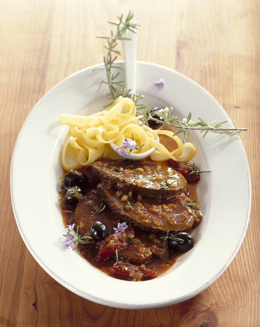 Brasato alla lombarda (Pot roast beef with olives)