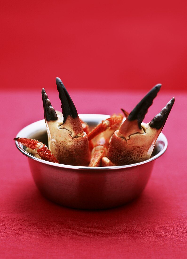 Crab claws in a small bowl