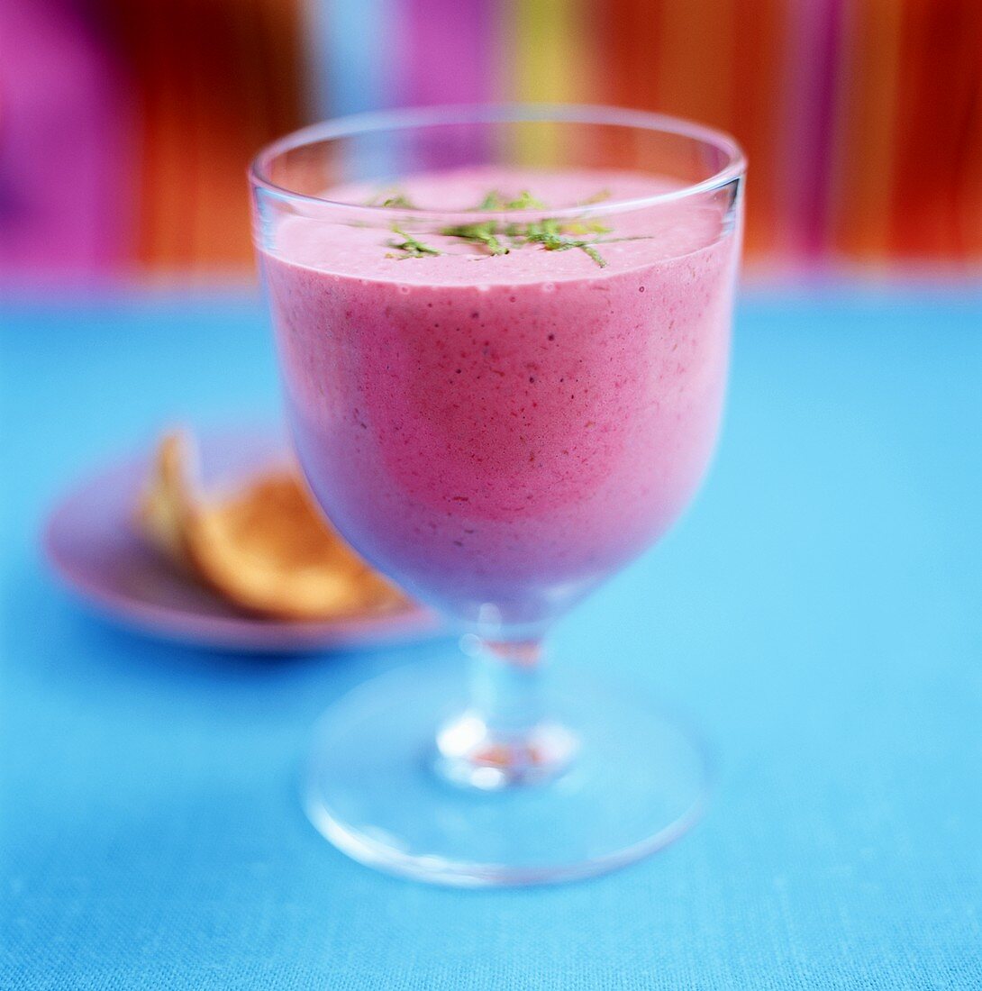 Raspberry milkshake in glass