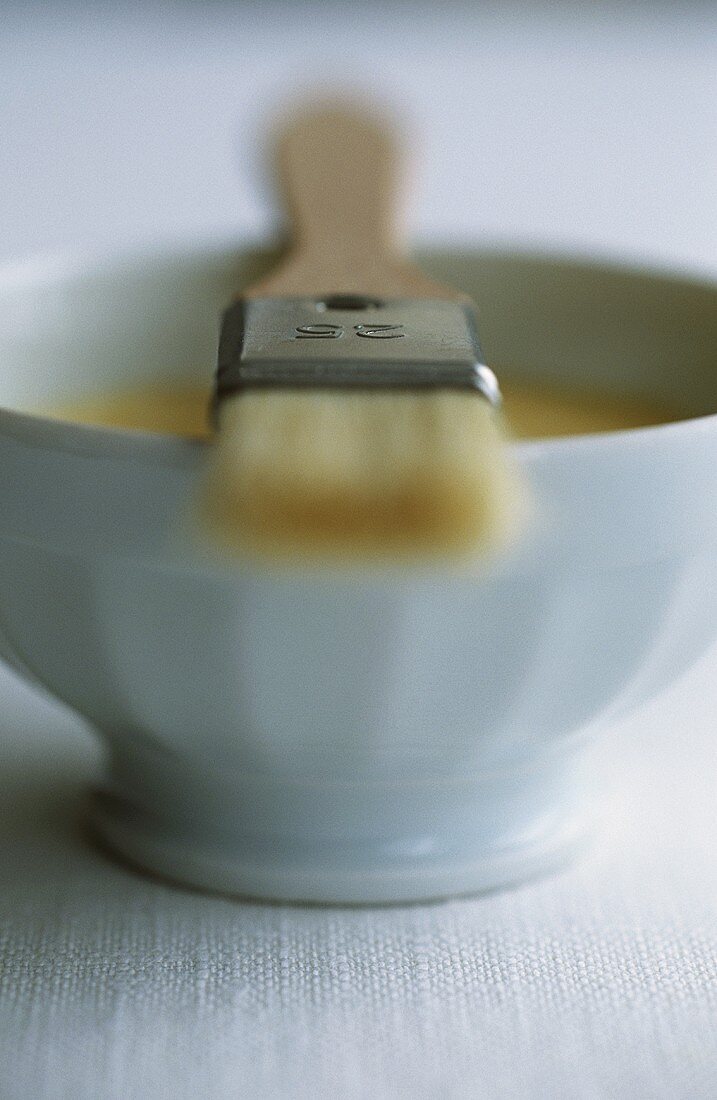 Small bowl with paintbrush
