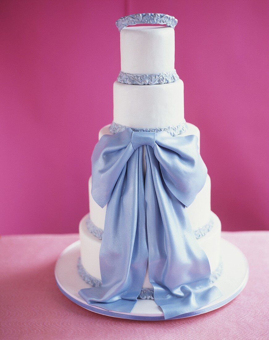 White marzipan cake with pale-blue bow