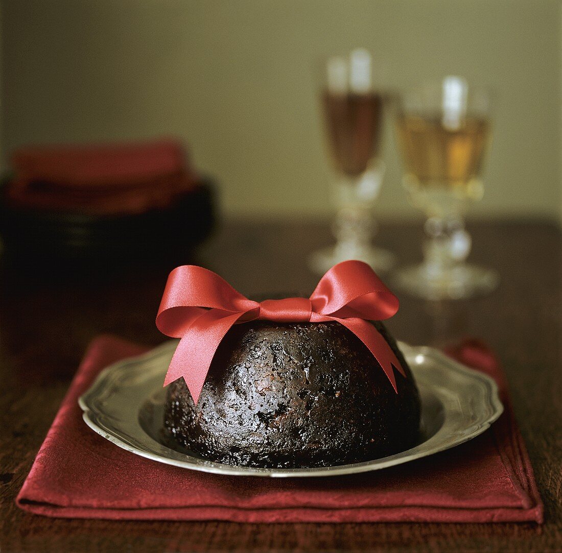 English Christmas pudding with red bow