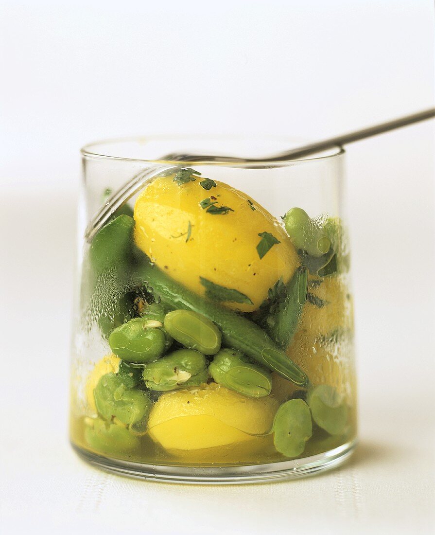 Saffron potatoes with green beans in glass