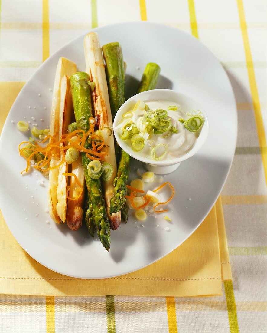 Roasted asparagus with spring onions and orange sauce