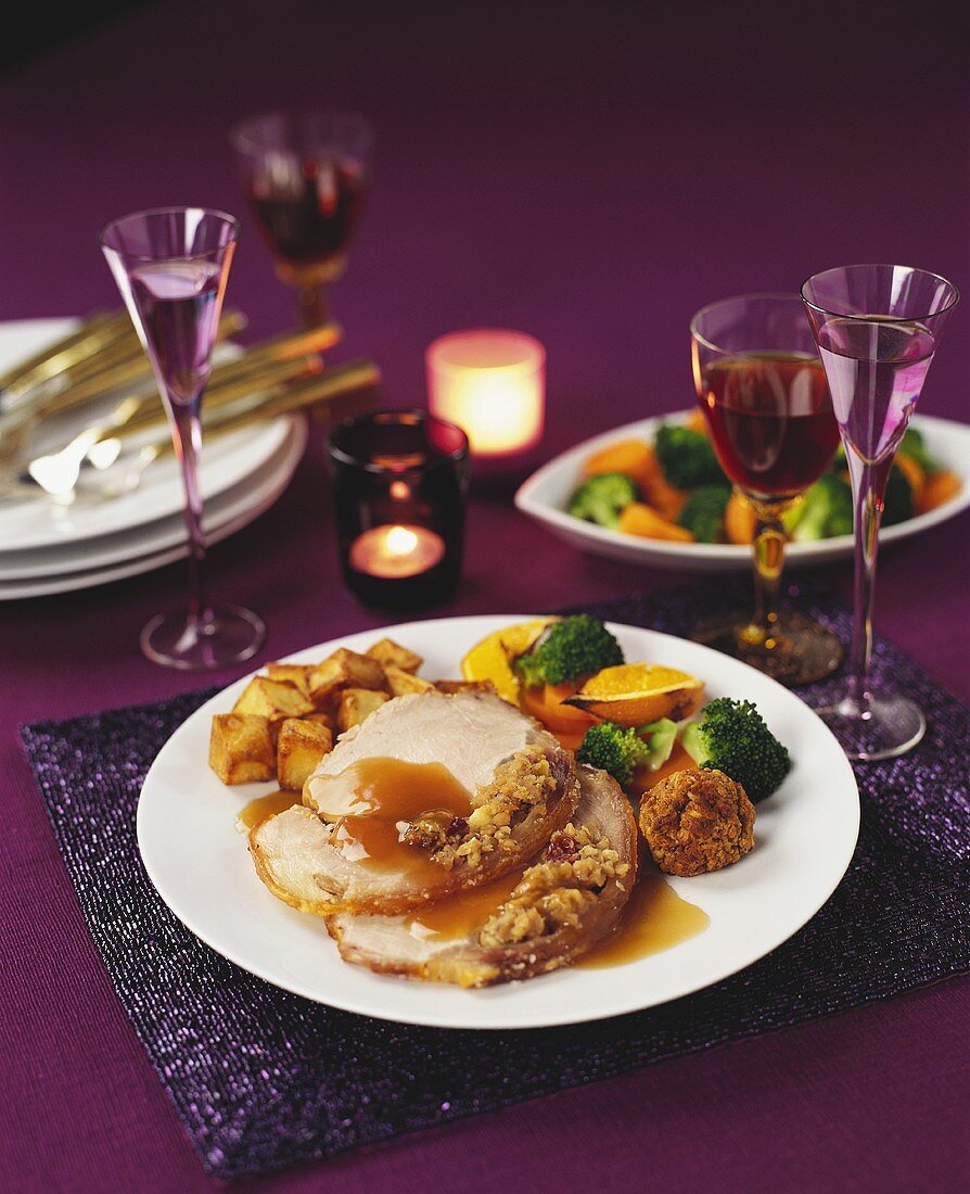 Roast pork with cranberry and chestnut stuffing