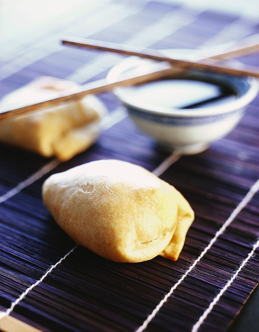 Filled pastry parcels with soy sauce